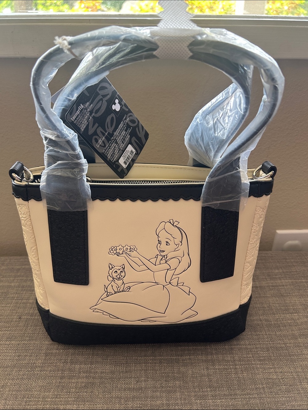 Loungefly Cream and Black Alice Illustration Satchel
